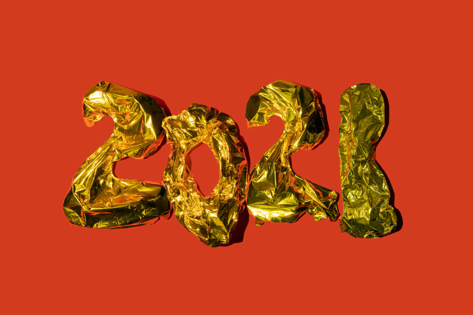 an illustrative header image for Slido's blog post listing the good things that happened in 2021 depicting the number 2021 cutout from paper